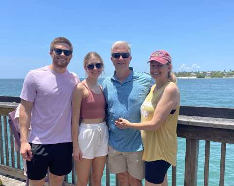family with Key West harbor in background